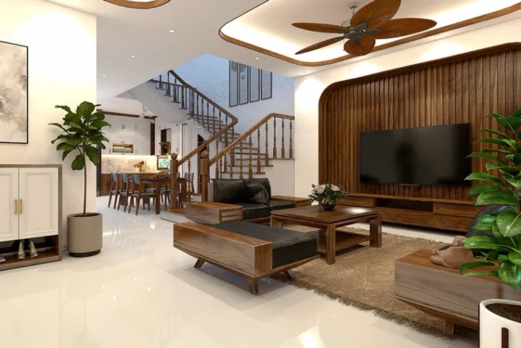 A happy couple in a bright, modern living room, smiling and enjoying a clean, organized space.